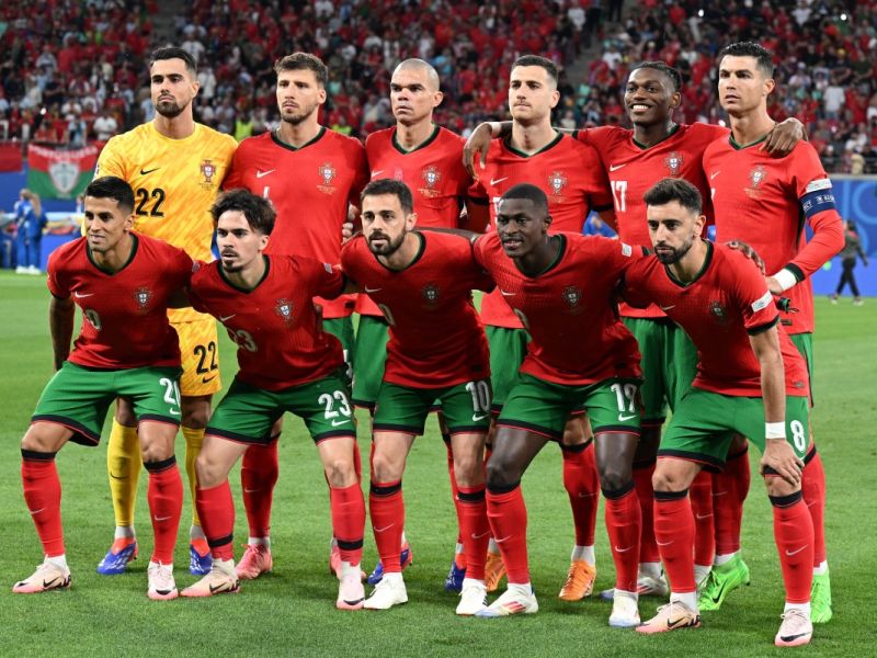 Portugal's players pose for a team photograph ahead of the UEFA Euro 2024 Group F football match between Portugal and the Czech Republic at the Leipzig Stadium in Leipzig, Eastern Germany on June 18, 2024. (Photo by PATRICIA DE MELO MOREIRA / AFP)