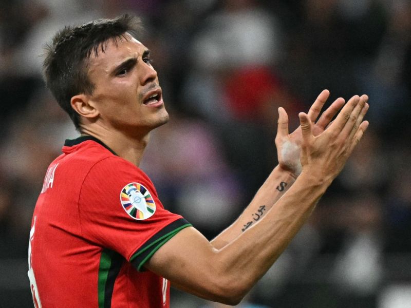Portugal's midfielder #06 Joao Palhinha reacts to a missed chance during the UEFA Euro 2024 round of 16 football match between Portugal and Slovenia at the Frankfurt Arena in Frankfurt am Main on July 1, 2024. (Photo by JAVIER SORIANO / AFP)
