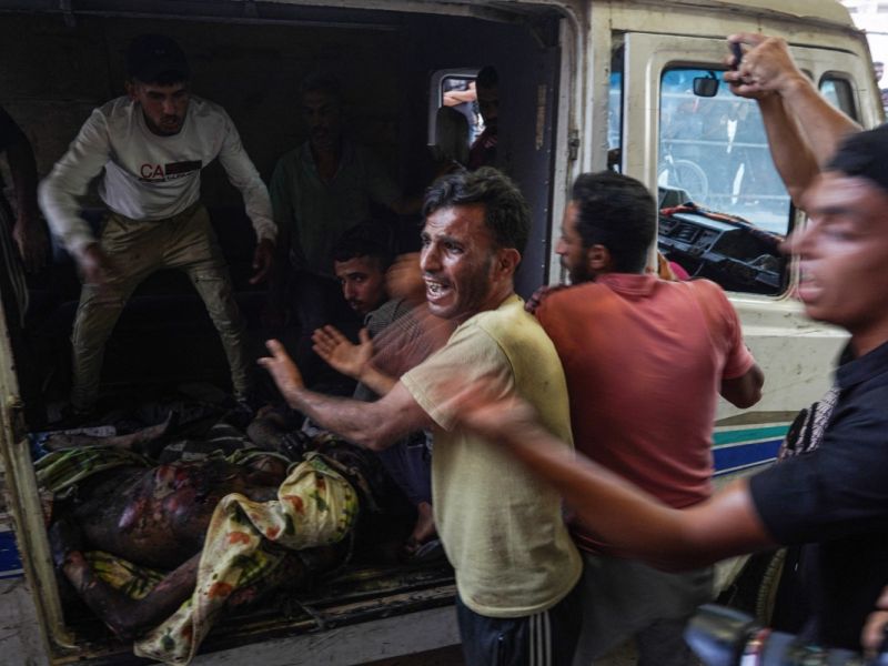 displaced Palestinians at Al-Tabeen school in Gaza City