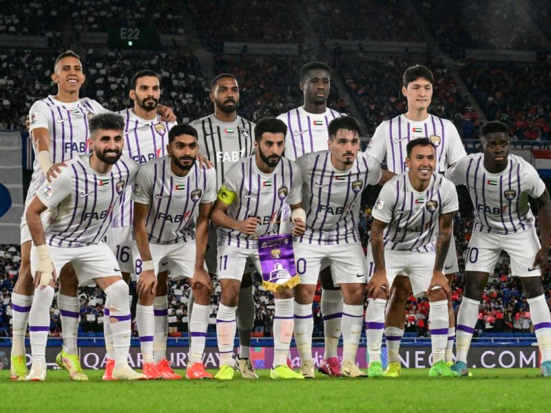 Members of Al Ain's starting side pose at the start of the AFC Champions League final first leg football match between UAE's Al Ain and Japan's Yokohama F. Marinos at Nissan Stadium in Yokohama, Kanagawa prefecture, south of Tokyo, on May 11, 2024. (Photo by Yuichi YAMAZAKI / AFP)