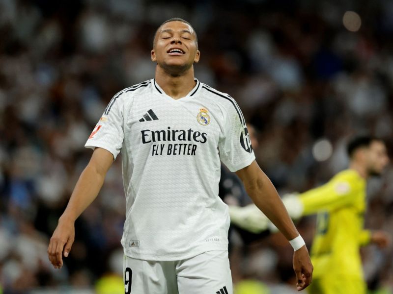 Real Madrid's French forward #09 Kylian Mbappe reacts during the Spanish league football match between Real Madrid CF and Villarreal CF at the Santiago Bernabeu stadium in Madrid on October 5, 2024. (Photo by OSCAR DEL POZO / AFP)