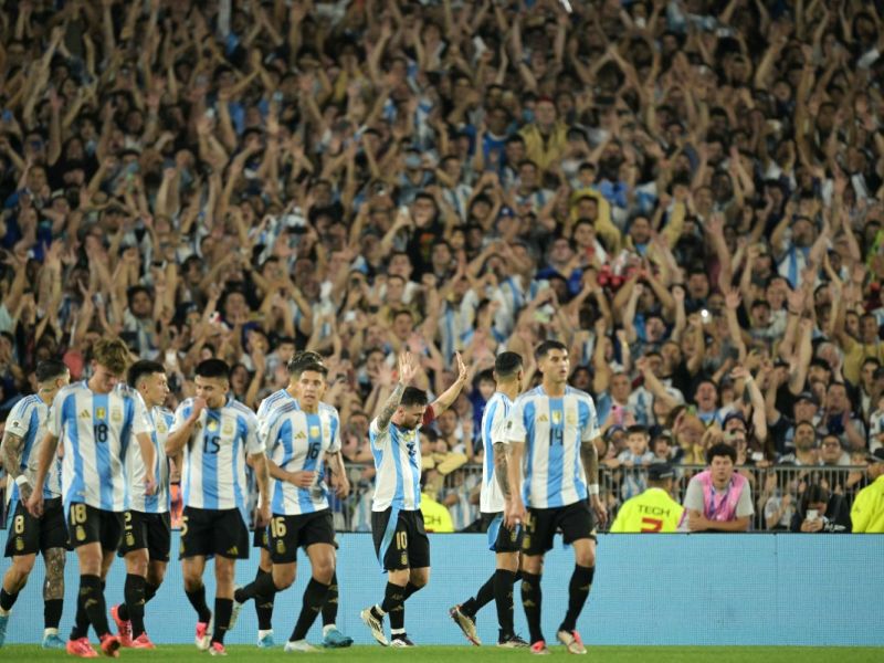 Argentina's forward #10 Lionel Messi celebrates with teammates after scoring a goal during the 2026 FIFA World Cup South American qualifiers football match between Argentina and Bolivia at the Mas Monumental stadium in Buenos Aires on October 15, 2024. (Photo by JUAN MABROMATA / AFP)