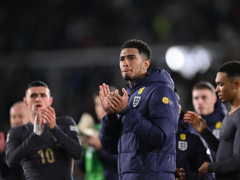England's midfielder #08 Jude Bellingham (C) reacts at the end of the UEFA Nations League, League B Group B2 football match Finland vs England at the Olympic Stadium in Helsinki, Finland, on October 13, 2024. (Photo by Jonathan NACKSTRAND / AFP)