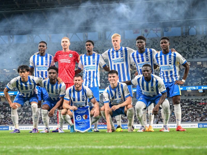Brighton’s players pose for photographs prior to an international club friendly football match between Brighton and Hove Albion FC and Kashima antlers FC at the Japan National Stadium in Tokyo on July 24, 2024. (Photo by Yuichi YAMAZAKI / AFP)