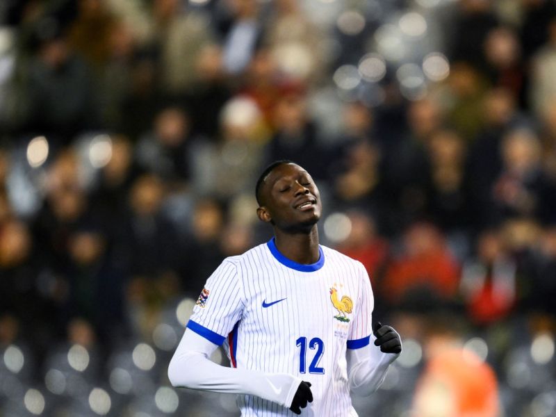 France's forward #12 Randal Kolo Muani reacts after missing a goal opportunity during the UEFA Nations League League A, Group A2 football match between Belgium and France, at the King Baudouin Stadium in Brussels, on October 14, 2024. (Photo by JOHN THYS / AFP)