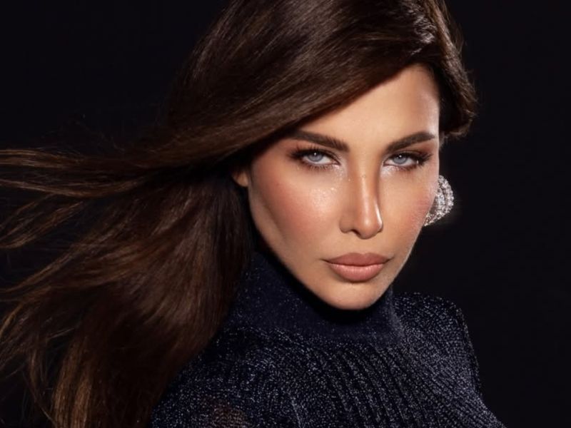 نانسي عجرم تتألق بفستان أسود شفاف من إيلي صعب في زفاف نجل محمد عبده