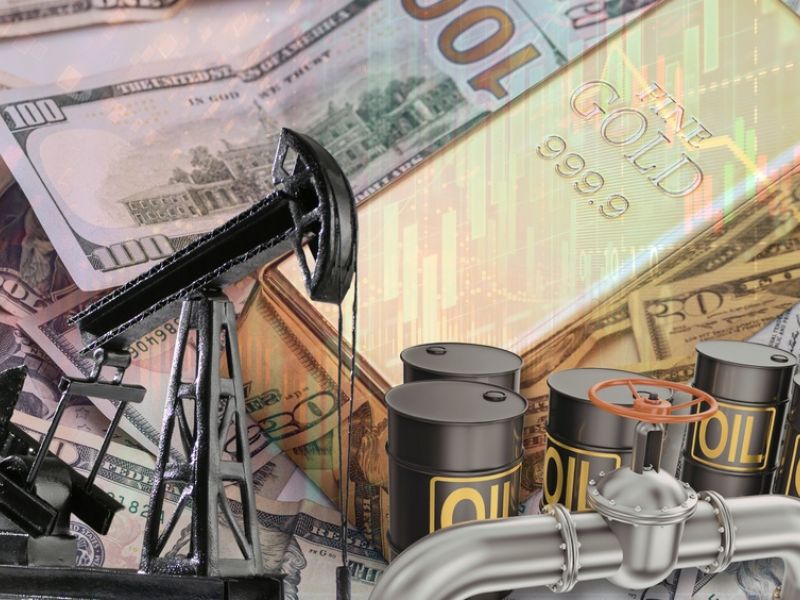Oil rises as gold drops