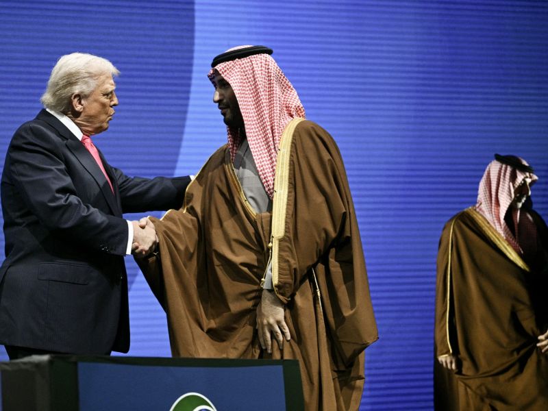 Trump and MBS shaking hands