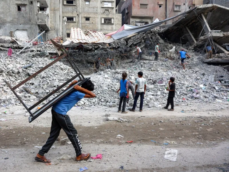 Scavengers amidst destruction in Gaza