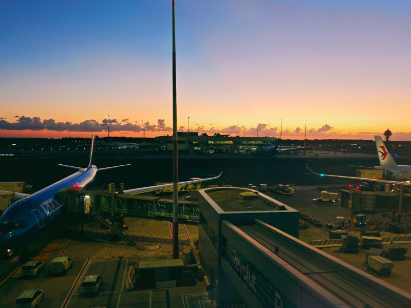 Rome,Italy-Sep.25th 2025: Leonardo da Vinci Rome Fiumicino Airport apron at sunset with airplanes