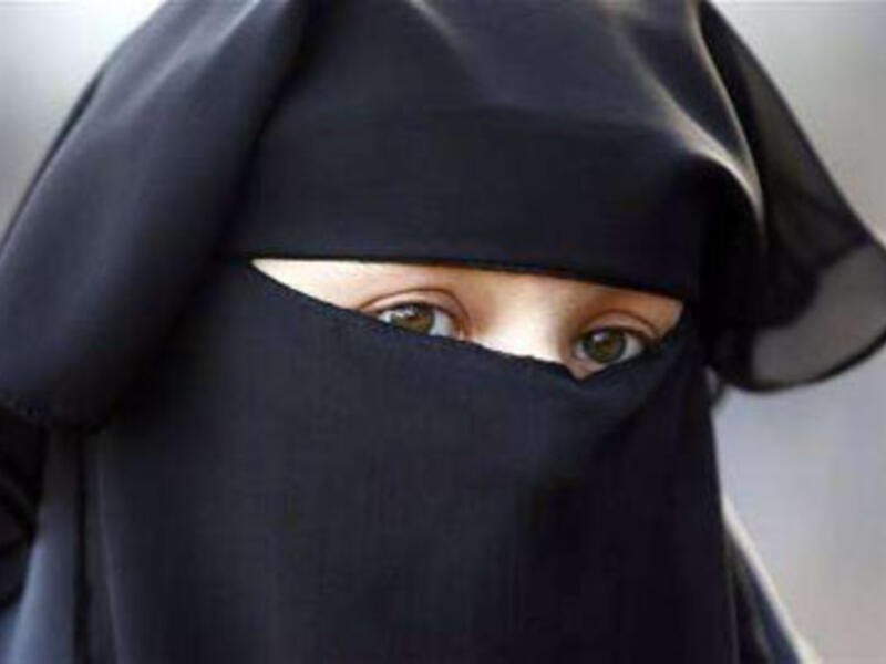 Burqlar! Careful, she might not be as much into you....as into your pockets.