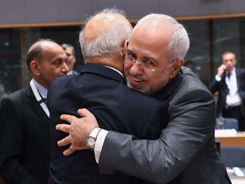Iran's Foreign Minister Mohammad Javad Zarif (R) and Iraq's FM Ibrahim Al-Jaafari attend a conference on "Supporting the future of Syria and the region" at the European Council in Brussels on April 25, 2018. 
Emmanuel Dunad / AFP