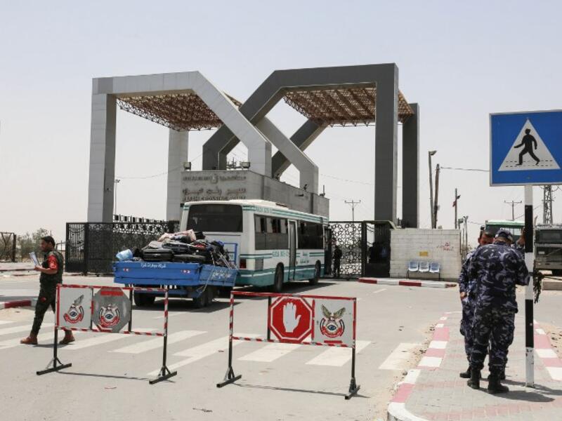 Palestinians wait to travel to Egypt through the Rafah border crossing, in the southern Gaza Strip, on May 18, 2018. Egyptian President Abdel Fattah al-Sisi has made a rare decision to open the Rafah crossing with Gaza for a month, allowing Palestinians to cross during the holy period of Ramadan. The decision to keep the crossing open was taken "to alleviate the suffering" of residents in the Palestinian enclave, Sisi said on Facebook late on May 17. (SAID KHATIB / AFP)