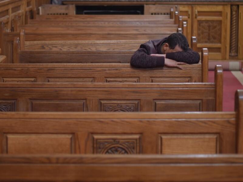 A Coptic Christian man mourns victims killed in an attack a day earlier, during an early morning ceremony at the Prince Tadros church in Egypt's southern Minya province, on November 3, 2018. 
MOHAMED EL-SHAHED / AFP