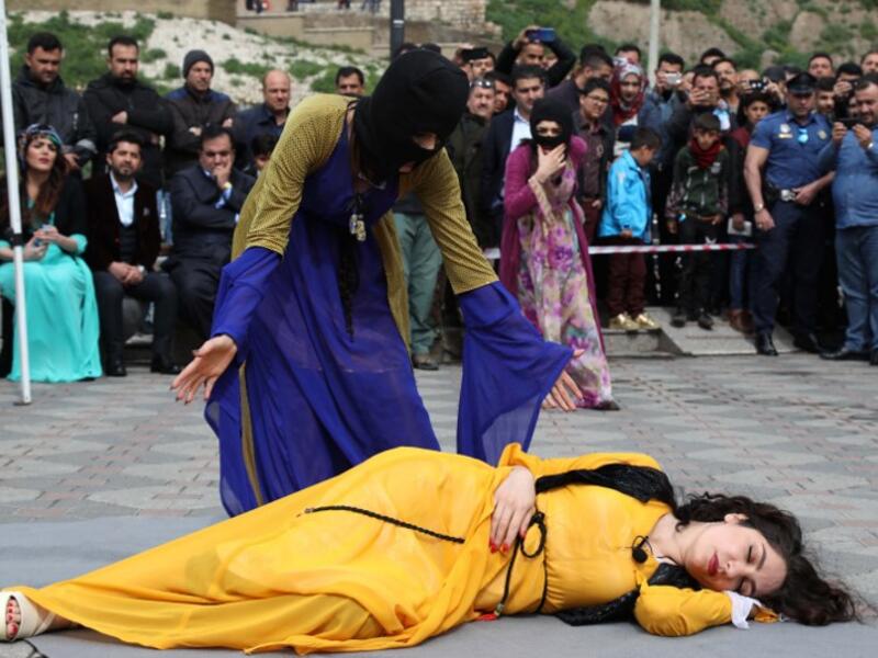 Iraqi Kurdish actresses perform in an open-air play in Arbil, the capital of the northern Iraqi Kurdish autonomous region
SAFIN HAMED / AFP