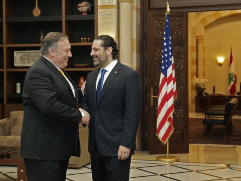 US Secretary of State Mike Pompeo (L) is welcomed by Lebanon's Prime Minister Saad Hariri (R) upon his arrival to the capital Beirut on March 22, 2019. 
ANWAR AMRO / AFP