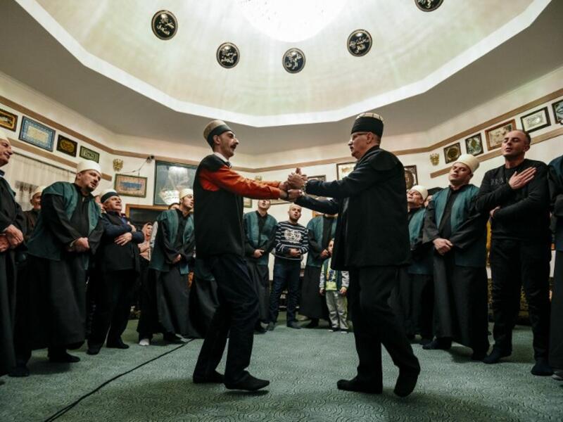 Kosovo Dervishes, adepts of Sufism, a mystical form of Islam, dance during a ceremony in a prayer room in Gjakova
Gent SHKULLAKU / AFP