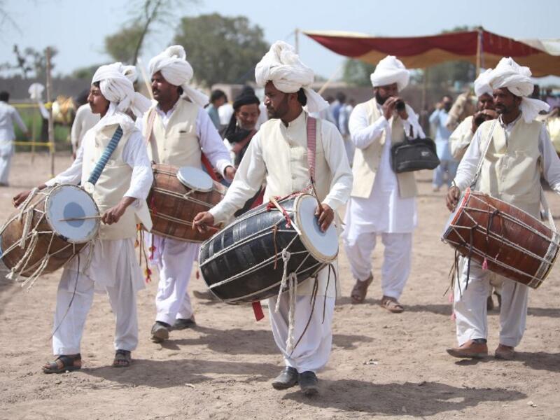 Traditional drumbeats and melodious shahnai are drowned out by thundering hoofs in the small Pakistani city of Tulamba, as riders pound down a dusty track seeking world record glory in the ancient sport of tent-pegging.

SS MIRZA / AFP
