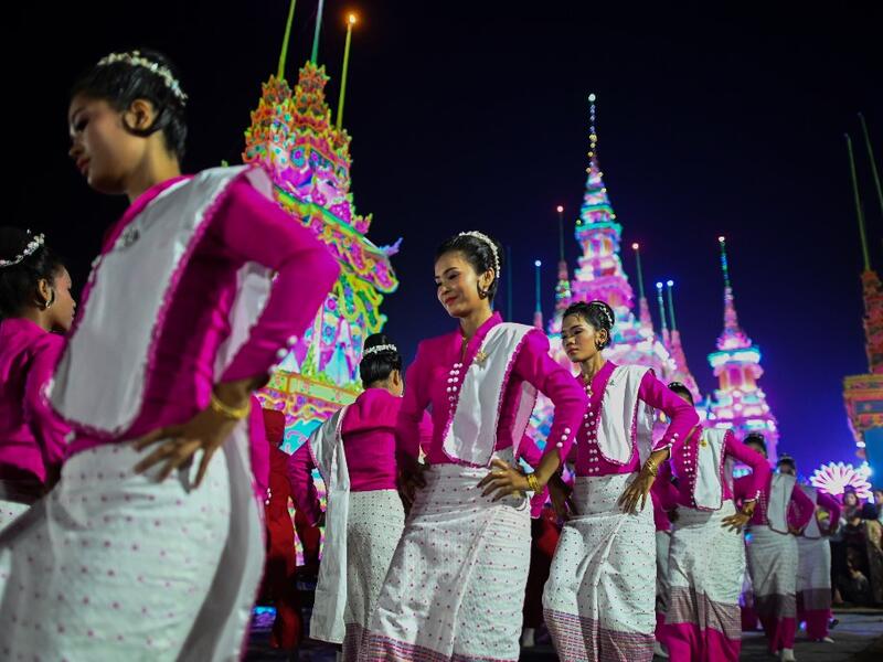 Traditional dancers perform during abbot Kay Lar Tha's funeral procession in Mudon, Mon State. 
Ye Aung THU / AFP