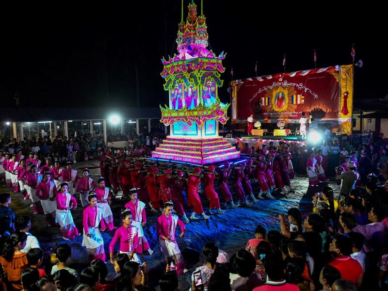 Traditional dancers perform during abbot Kay Lar Tha's funeral procession in Mudon, Mon State. 
Ye Aung THU / AFP