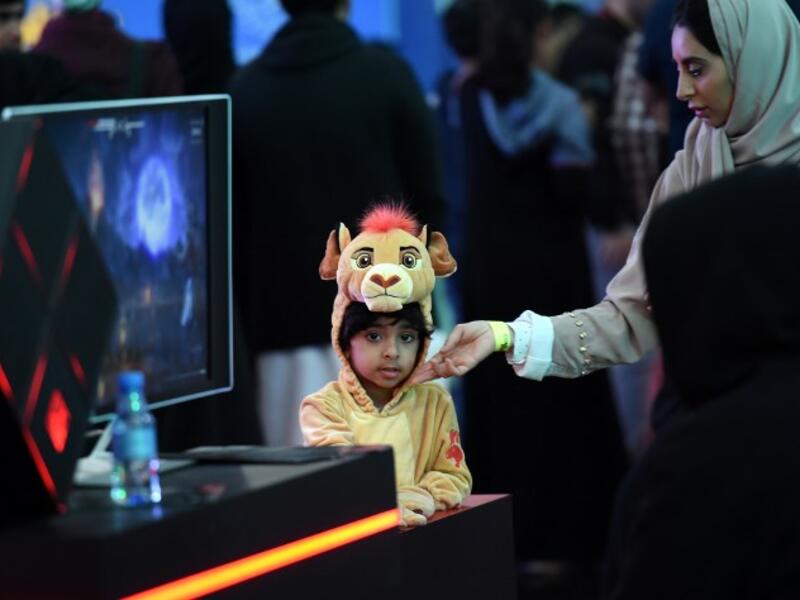 A Saudi child dressed as Simba from Disney's 1994 animated "The Lion King" film attends the first ever Comic-Con Arabia event held in the capital Riyadh on November 25, 2017. 
(FAYEZ NURELDINE / AFP)