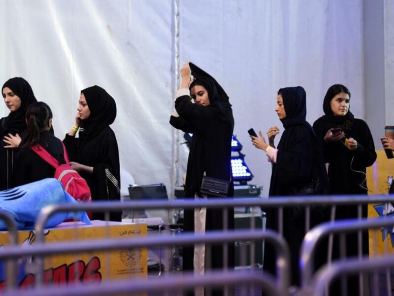 Saudi girls attend the first ever Comic-Con Arabia event held in the capital Riyadh on November 25, 2017. 
(FAYEZ NURELDINE / AFP)
