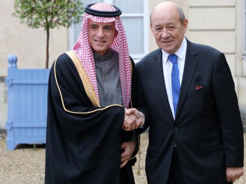 Saudi foreign affairs minister Adel Al Jubeir (L) is welcomed by French foreign affairs minister Jean Yves Le Drian upon his arrival for a summit from the underfunded G5 Sahel anti-terror coalition on Dec. 13, 2017 (Ludovic MARIN/AFP)