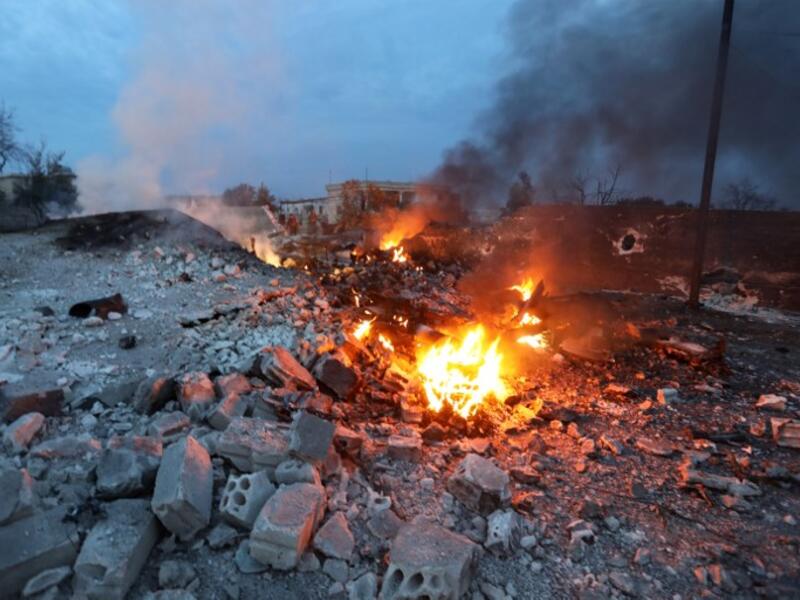 A picture taken on Feb. 3, 2018, shows smoke billowing from the site of a downed Sukhoi-25 fighter jet in Syria's northwest province of Idlib. Rebel fighters shot down a Russian plane over Syria's northwest Idlib province and captured its pilot, the Syrian Observatory for Human Rights said. 

(OMAR HAJ KADOUR / AFP)