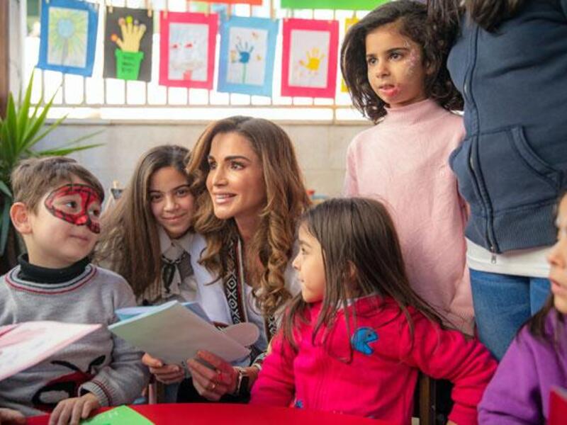 Queen Rania meets with children at Al Hussein Social Foundation for Orphans, on Wednesday (Photo courtesy of Royal Court)
