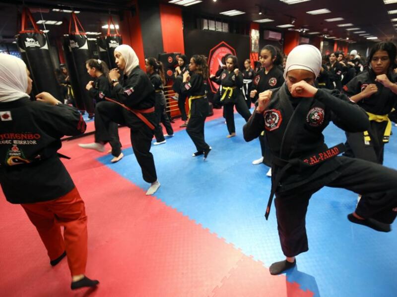 Kuwaiti women practise hybrid martial art Kajukenbo in a club in Kuwait City.
Yasser Al-Zayyat / AFP