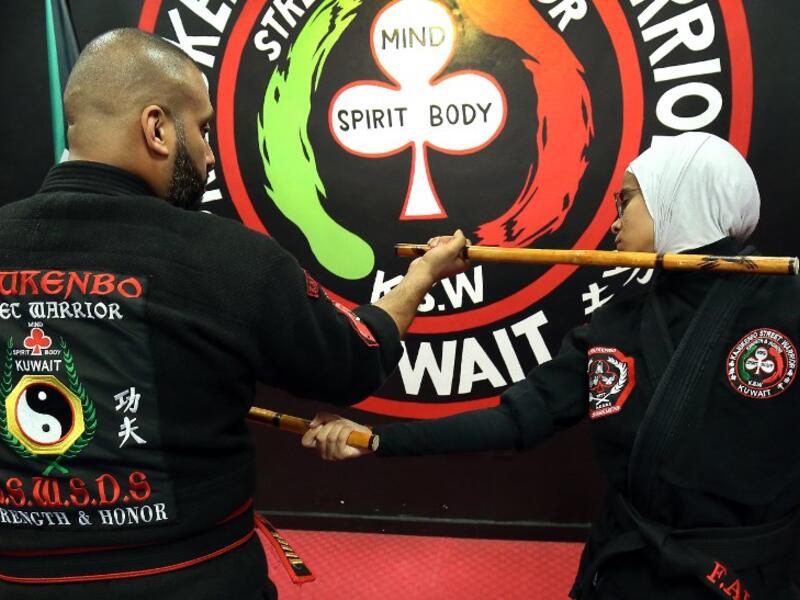 Kuwaiti women practise hybrid martial art Kajukenbo in a club in Kuwait City.
Yasser Al-Zayyat / AFP
