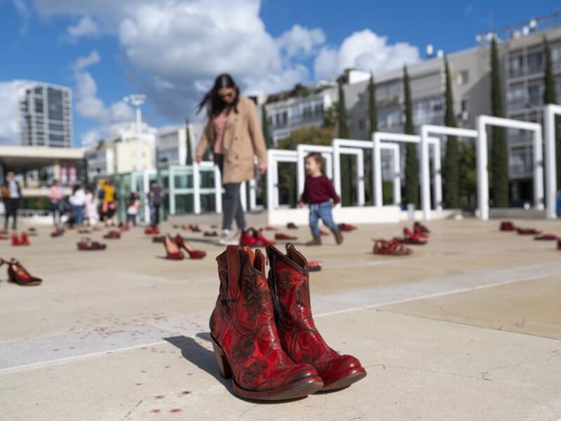 Installation of red shoes during a rally against domestic violence in the Israeli coastal city of Tel Aviv on December 4, 2018  (Twitter)