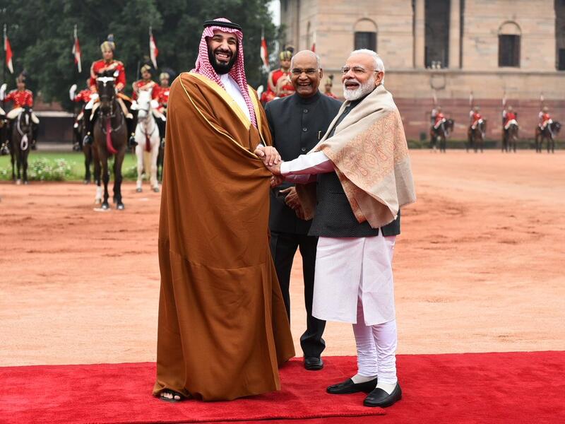 India's President Ram Nath Kovind (C) looks on as Saudi Crown Prince Mohammed bin Salman (L) and India's Prime Minister Narendra Modi shake hands during a ceremonial reception at the presidential palace in New Delhi  (Twitter)