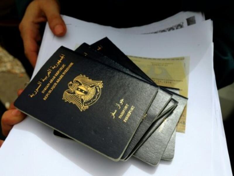 Syrian passports are coming under fire. (AFP/File)