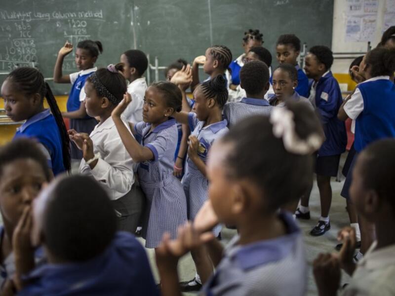 Girls line up to practice self defence methods during a session with NGO Action Breaks Silence (ABS) called "Empowerment through self-defence for women and girls". (GULSHAN KHAN / AFP)