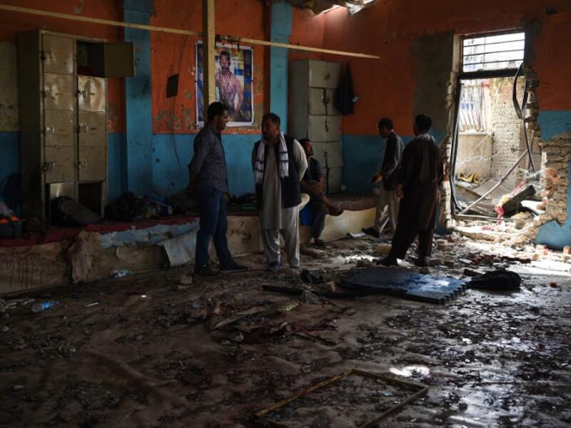  At least 20 people killed including two Afghan journalists after twin blasts at a Kabul wrestling club on September 5 that left another 70 wounded, officials said. (WAKIL KOHSAR / AFP) 