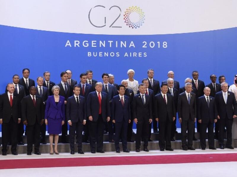 Participants of the G20 Leaders' Summit in Buenos Aires, pose for a family photo on November 30, 2018. Global leaders gather in the Argentine capital for a two-day G20 summit beginning on Friday likely to be dominated by simmering international tensions over trade.
SAUL LOEB / AFP