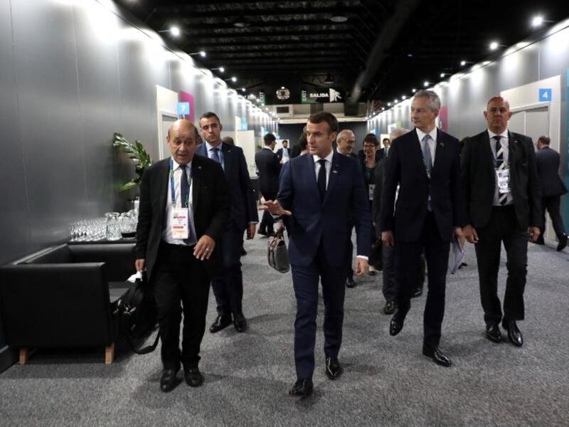 France's President Emmanuel Macron (C) walsk next to some of his ministers in the sidelines of the G20 Summit in Buenos Aires, on November 30, 2018.
Ludovic MARIN / AFP