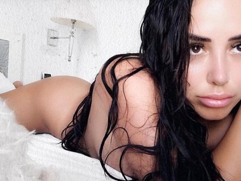 Body confidence: In another more racier image, Marnie went naked as she sprawled out across her bed (Instagram)