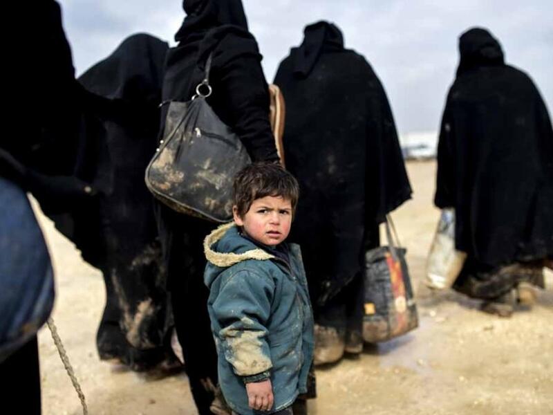 Syrian refugees on the Turkish border. (AFP/Bulent Kilic) 