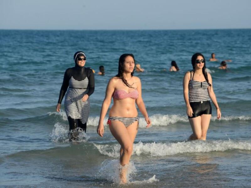 French mayors refuse to remove the bikini ban despite France's Council of State suspending the ban. (AFP/File) 