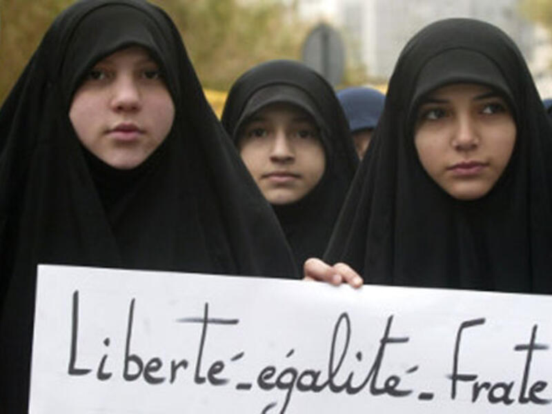 Muslim women protest about France’s decision to ban the veil. (AFP/File) 