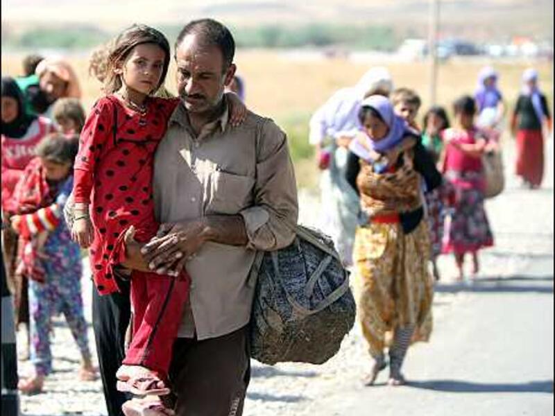  84,000 civilians fled to Erbil, 78,372 to Sulaimani and 6,000 to Duhok and Zakho from Rabea and Zummar (AFP/File)