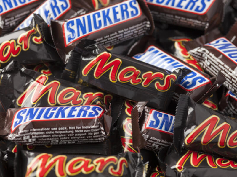 The recall follows the discovery of a piece of red plastic in one of Snickers bar purchased in Germany.  (Shutterstock/Ekaterina Minaeva)