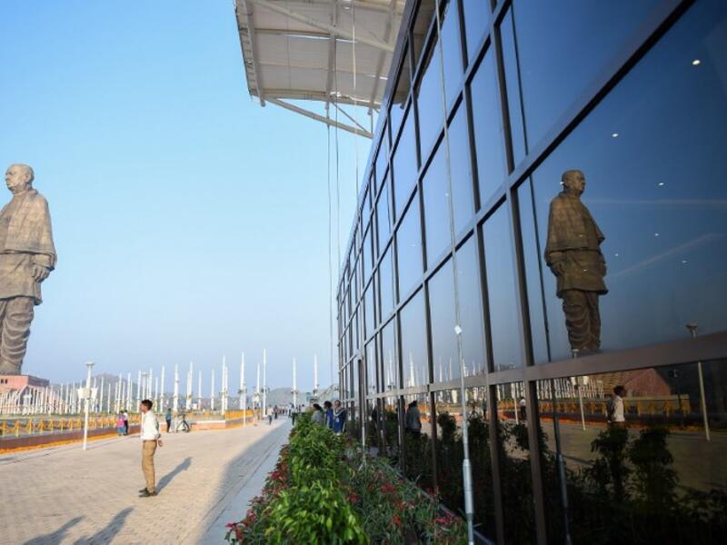 A reflection of the "Statue Of Unity", the world's tallest statue dedicated to Indian independence leader Sardar Vallabhbhai Patel, is pictured during its inauguration overlooking the Sardar Sarovar Dam. (SAM PANTHAKY / AFP)