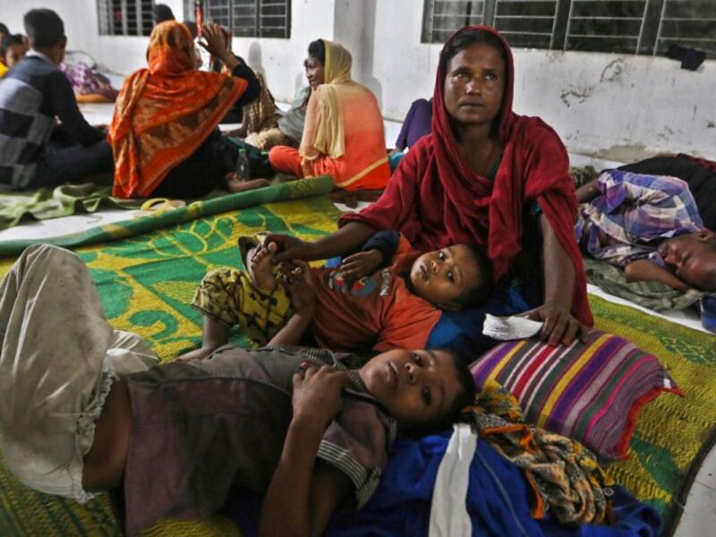 Bangladeshi villagers take refuge in a cyclone shelter following an evacuation by authorities in the coastal villages of the Cox's Bazar district on May 29, 2017 as Cyclone 'Mora' gradually approaches towards the coastline. (AFP/Stringer)