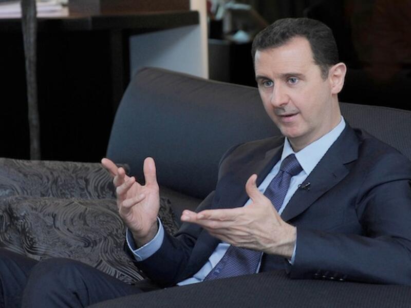 Syrian President Bashar al-Assad during an interview. (AFP/File)