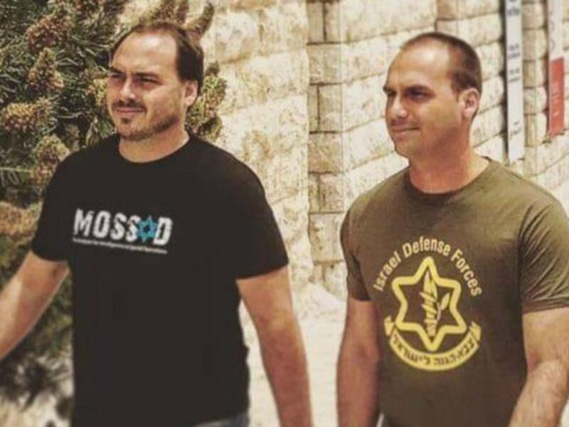 Carlos and Eduardo Bolsonaro were both seen wearing pro-Israel shirts [Twitter]