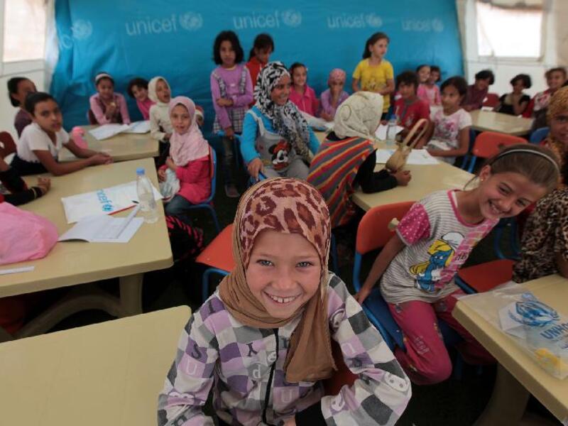The Education Ministry plans to introduce double shifts at 102 schools where Syrian students are enrolled, bringing the total number of schools working on two shifts to 200. (File photo)