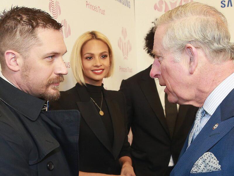 Tom Hardy beams with pride as he receives CBE for his services to drama from Prince Charles at Buckingham Palace (Twitter)